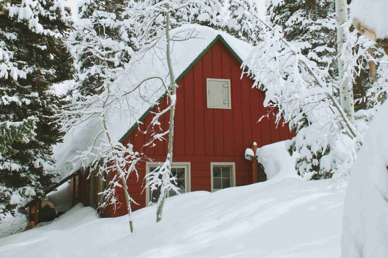 house with snow and ice